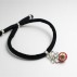PULSERA BOLA DE NAVIDAD CON LAZO BAÑO PLATA